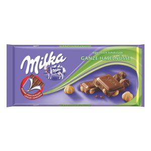 Milka - Ciocolată cu lapte și alune întregi 100 gr.